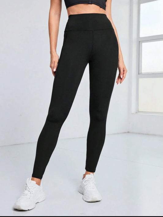 Leggings Deportivos Negros con Malla y Bolsillo